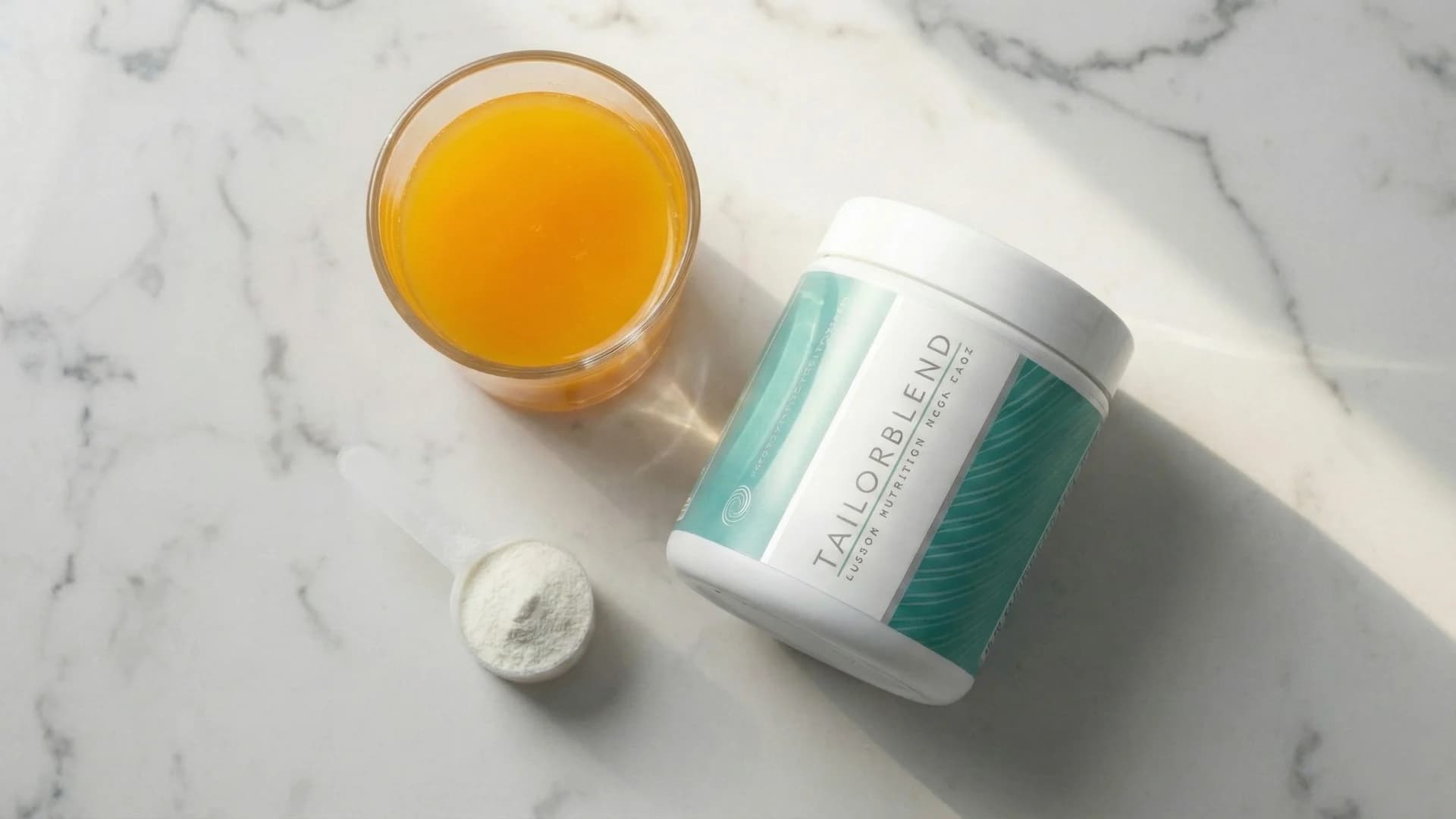 TAILORBLEND container with orange drink aerial view